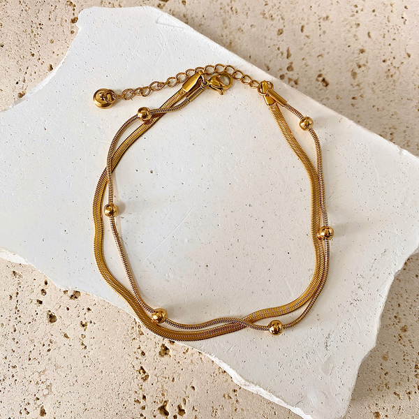 Lxalry Stainless Steel 18K Gold Plated Double Layer Snake Chain Anklet – Tarnish-Free, Waterproof Summer Beach Jewelry with Gold Beads for Women and Men